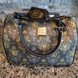 Brand new with tags 50th anniversary passholder haunted mansion purse / handbag.